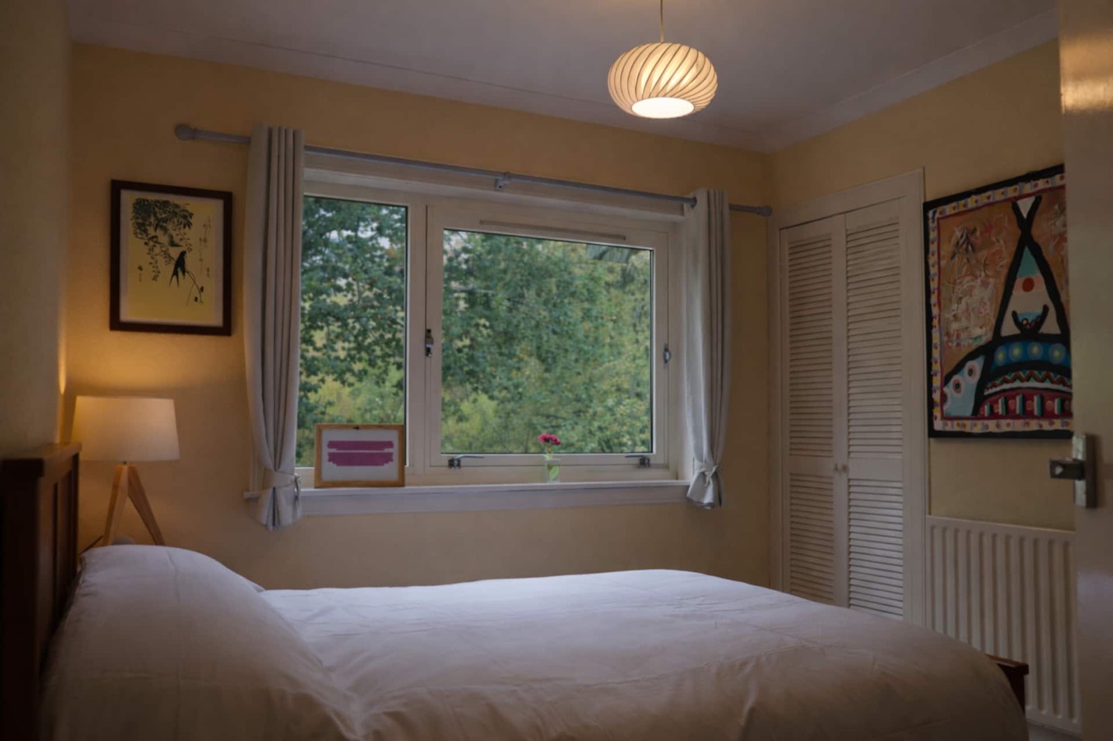 The ground-floor double, with the garden through the window