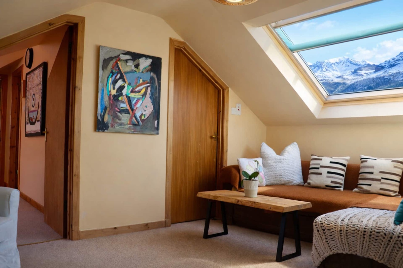The suite's sitting area, snow on the tops through the skylight